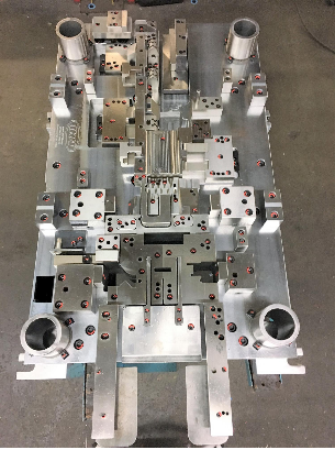 Progressive die stamping