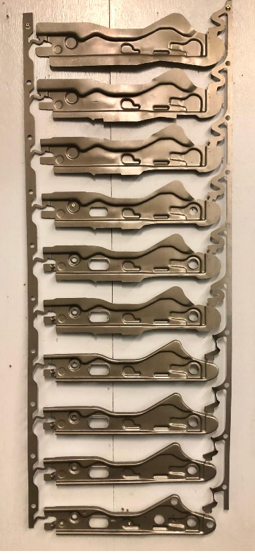 Progressive die strip automotive