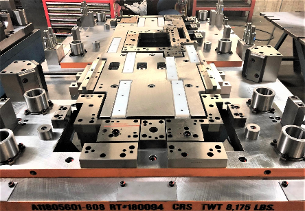 Progressive die with UHMW