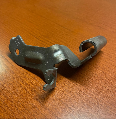 Curl stamping die part